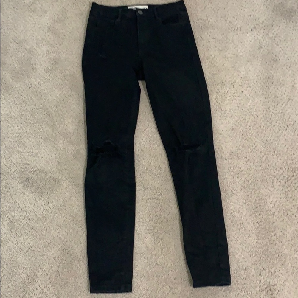 Garage black skinny jeans with knee rips high rise